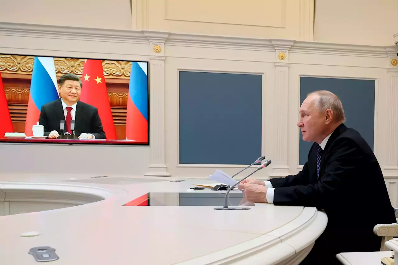 China's Xi Jinping hails Putin as 'progressive force' but ducks question of military alliance