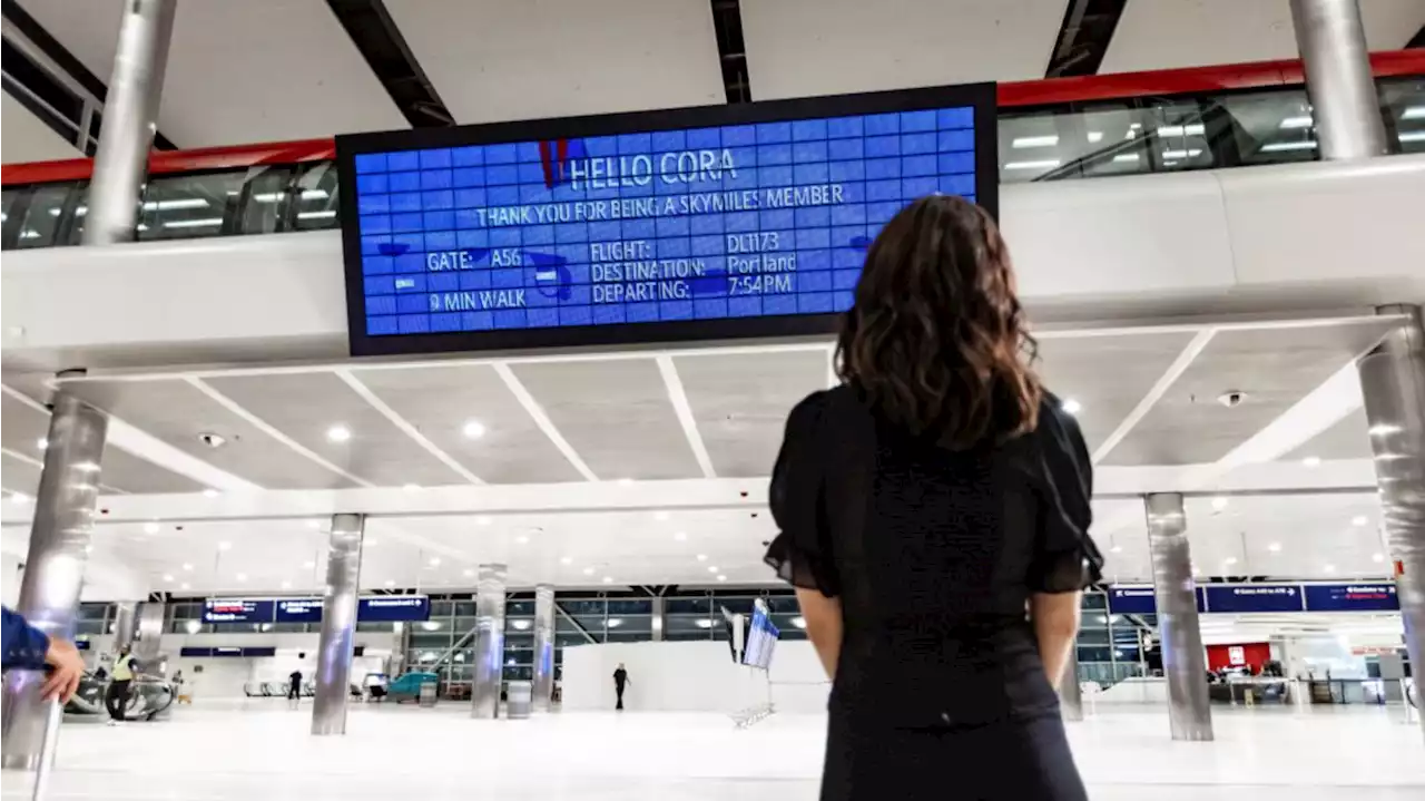 Airport departure board uses facial recognition to show your flight info