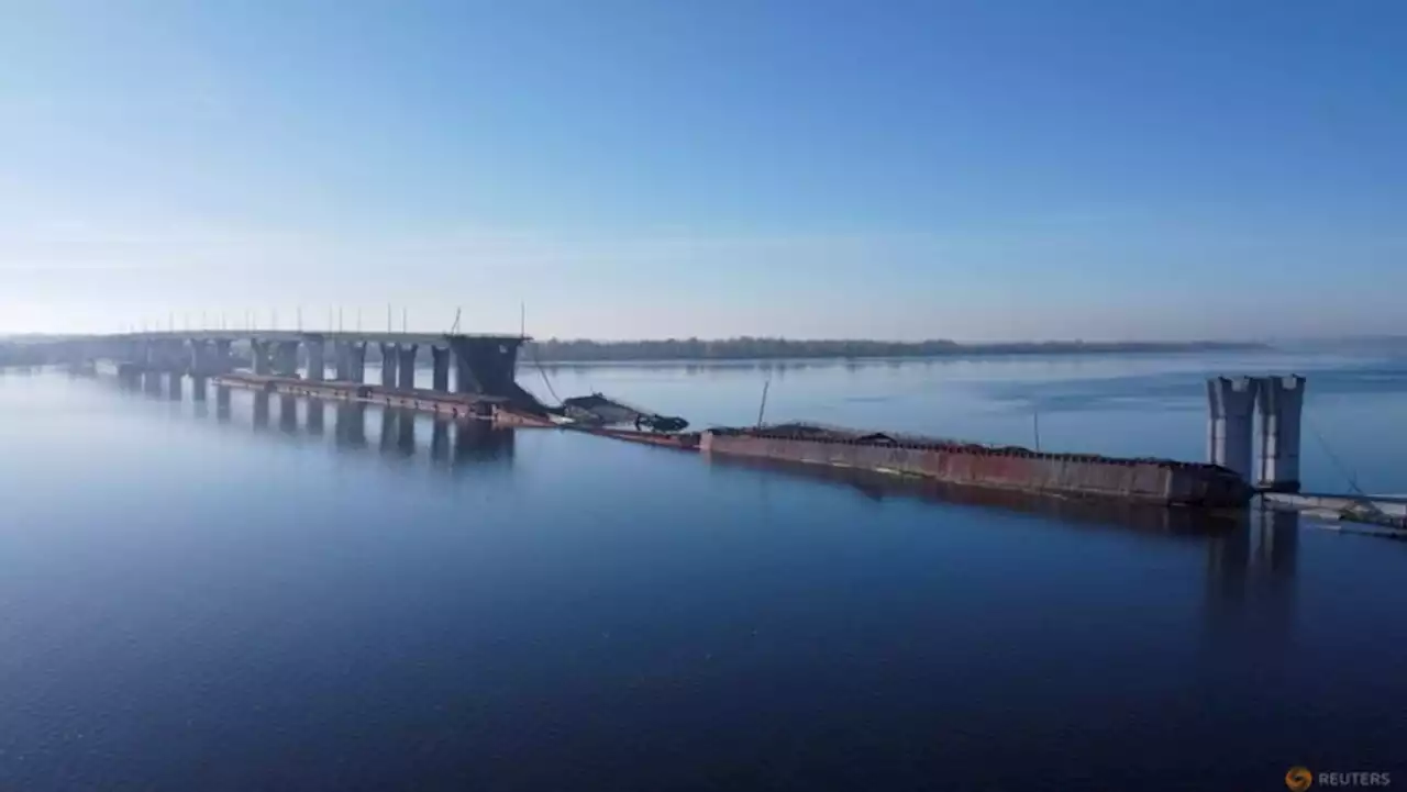 Ukrainians in Kherson wait for loved ones to cross frontline river