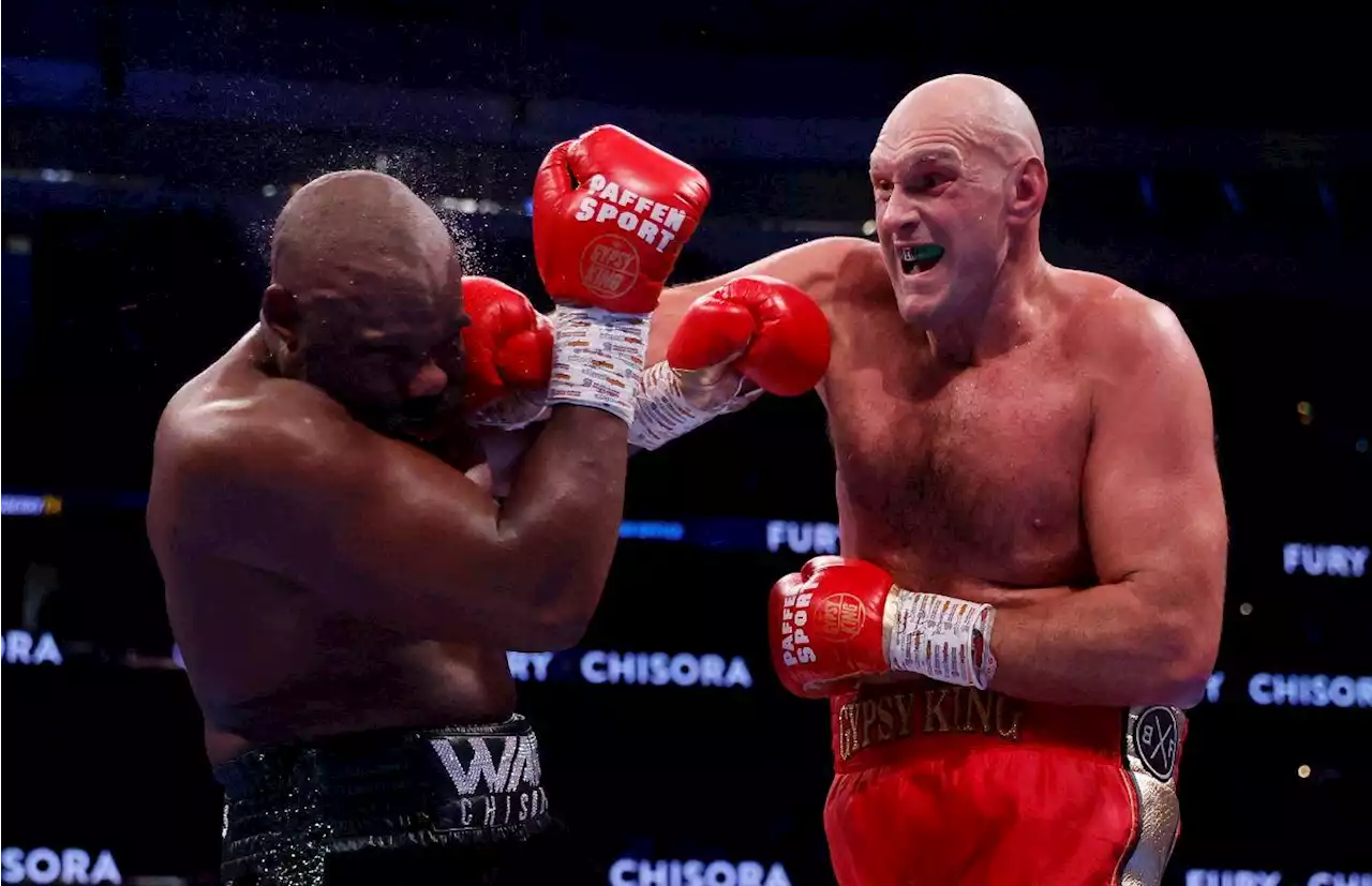 Fury taunts Usyk after beating Chisora to retain WBC title