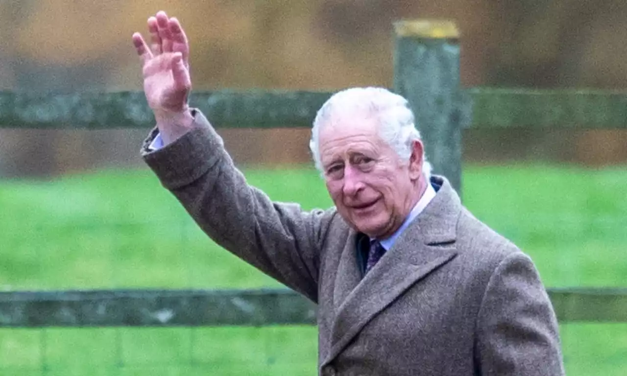 King Charles waves to fans as he attends church at Sandringham