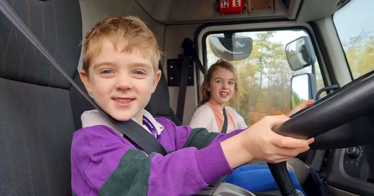 Boy, 5, who just can't get enough of Bensons for Beds trucks