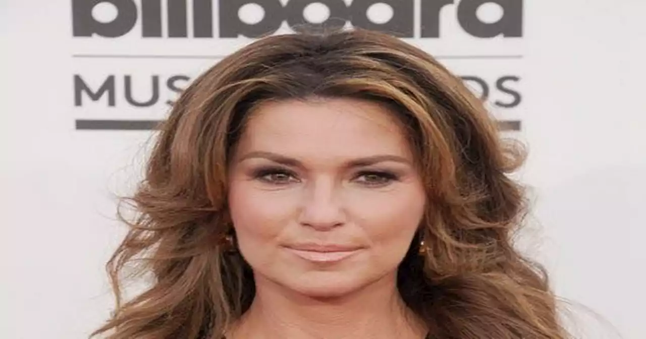 Shania Twain 'used to flatten her breasts' to avoid sexual abuse from stepfather