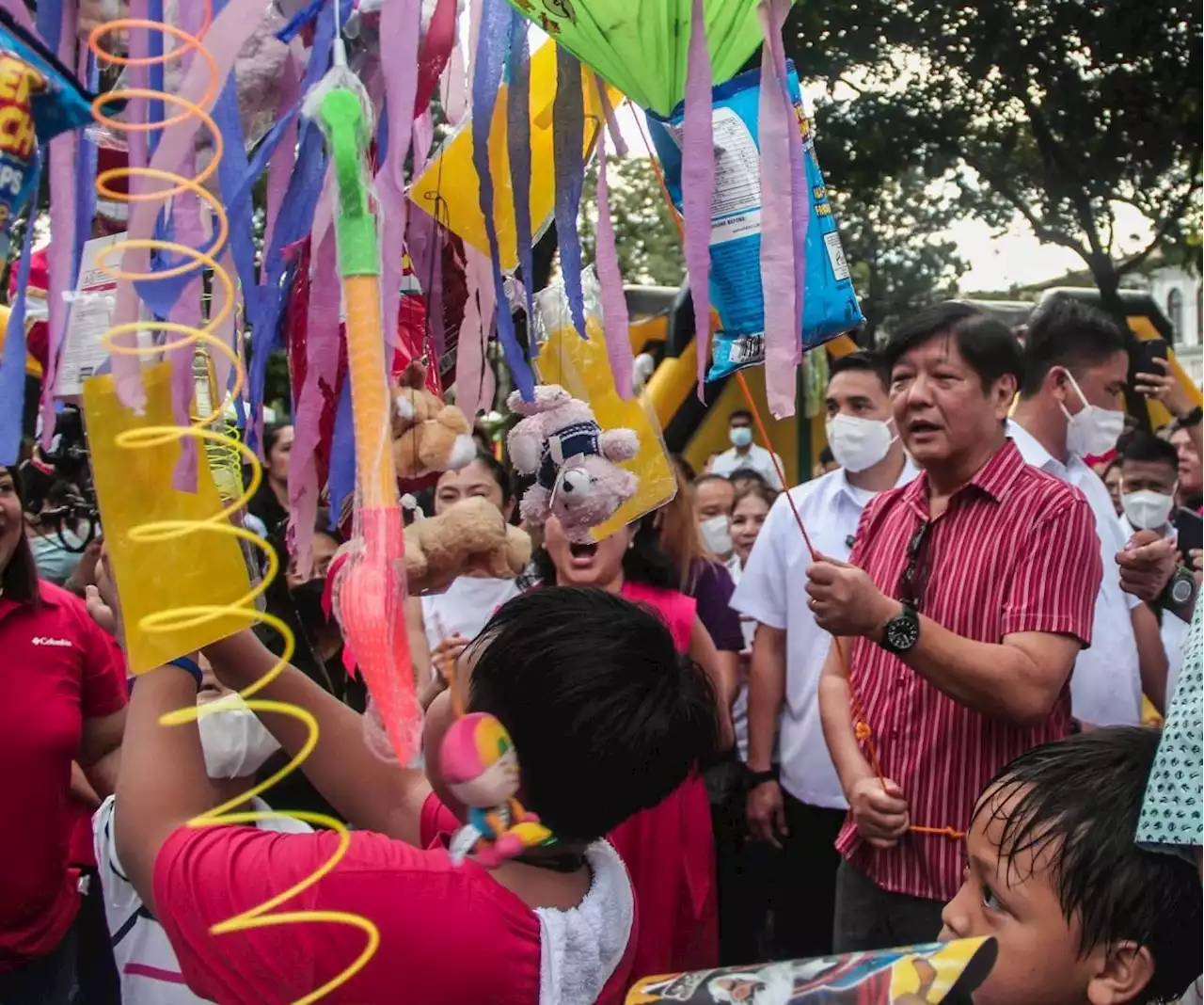 Marcos plays Santa to hundreds of kids