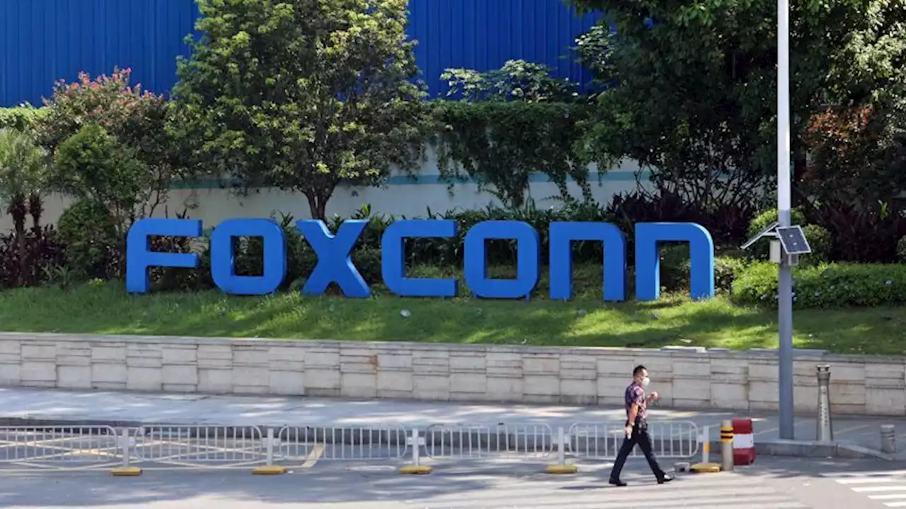 Foxconn says it's restoring production at the world's largest iPhone factory | CNN Business