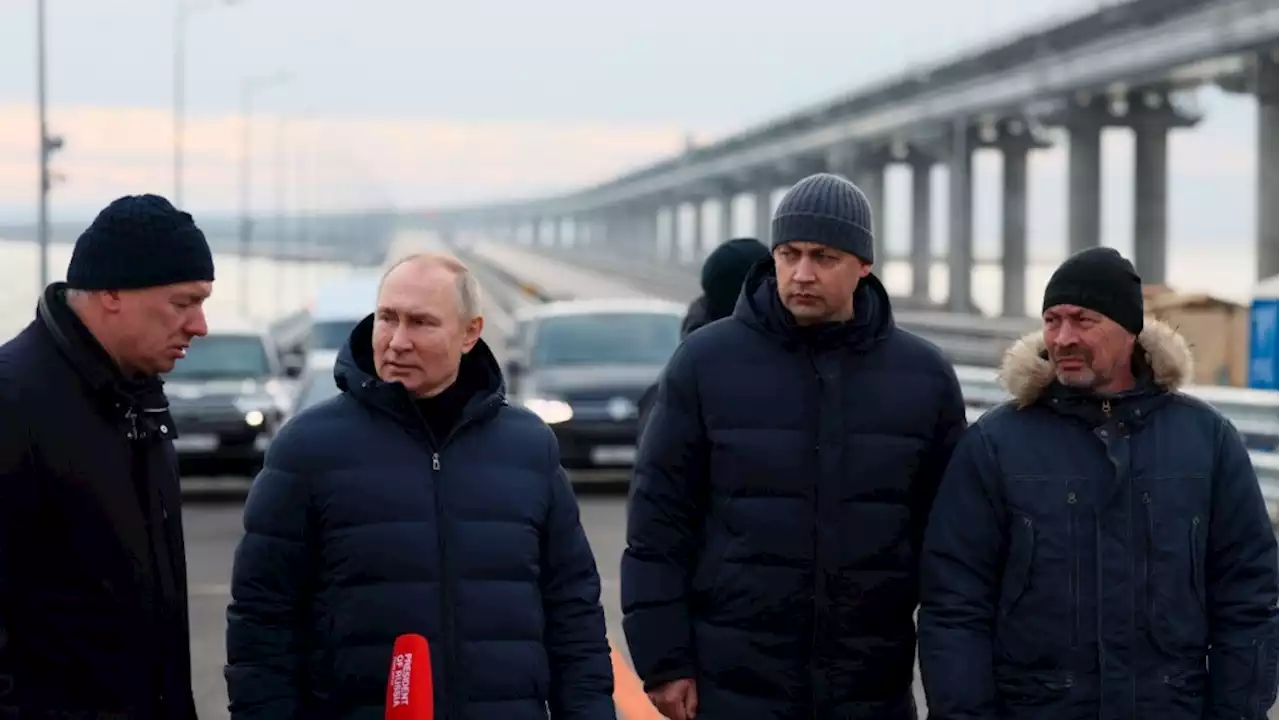 Russia's Putin drives across repaired bridge to Crimea