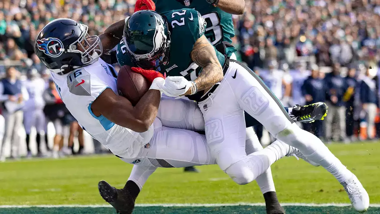 Titans' Treylon Burks takes brutal hit to facemask, somehow maintains touchdown catch