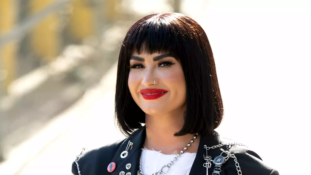 Demi Lovato let her tattoos take centre stage with a shaggy pixie cut