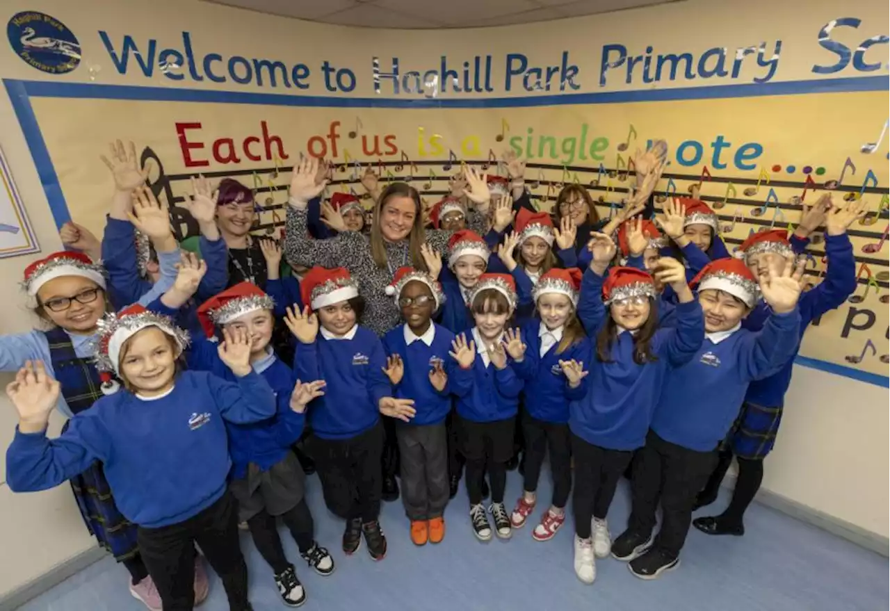 'We love to sing': Glasgow pupils bring Christmas cheer to East End