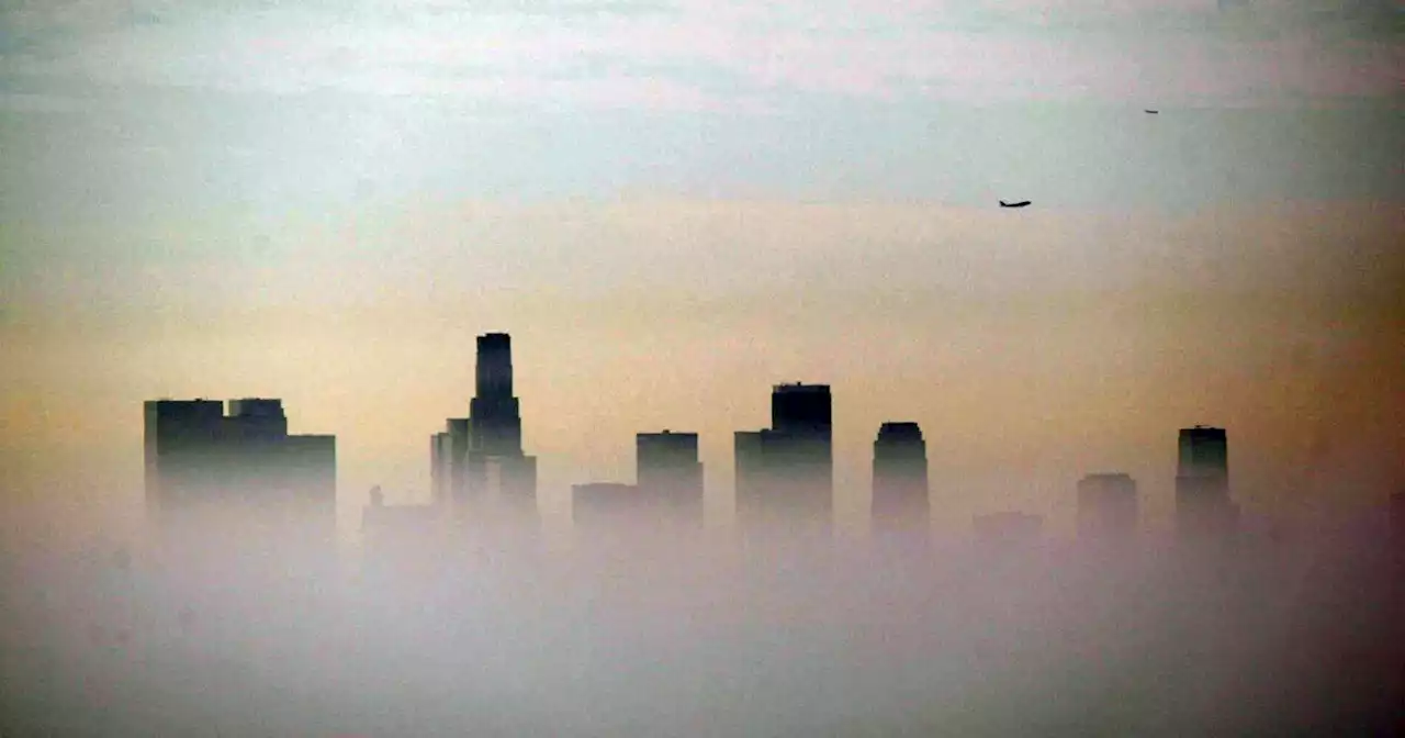 Local air regulators say it's impossible to meet smog standards without federal help