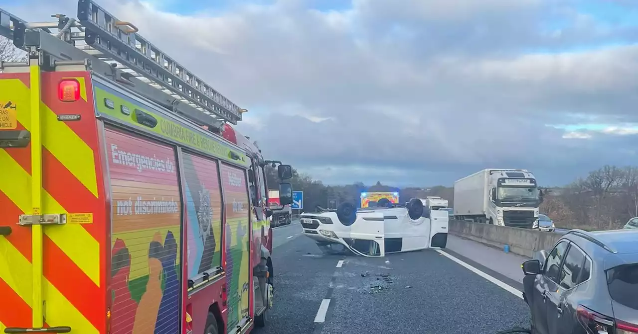 Miles of delays on M6 after van flips on its roof - live