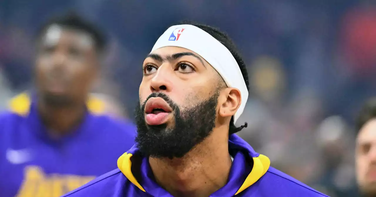 Lakers star Anthony Davis leaves early with flu-like symptoms in loss to Cavs