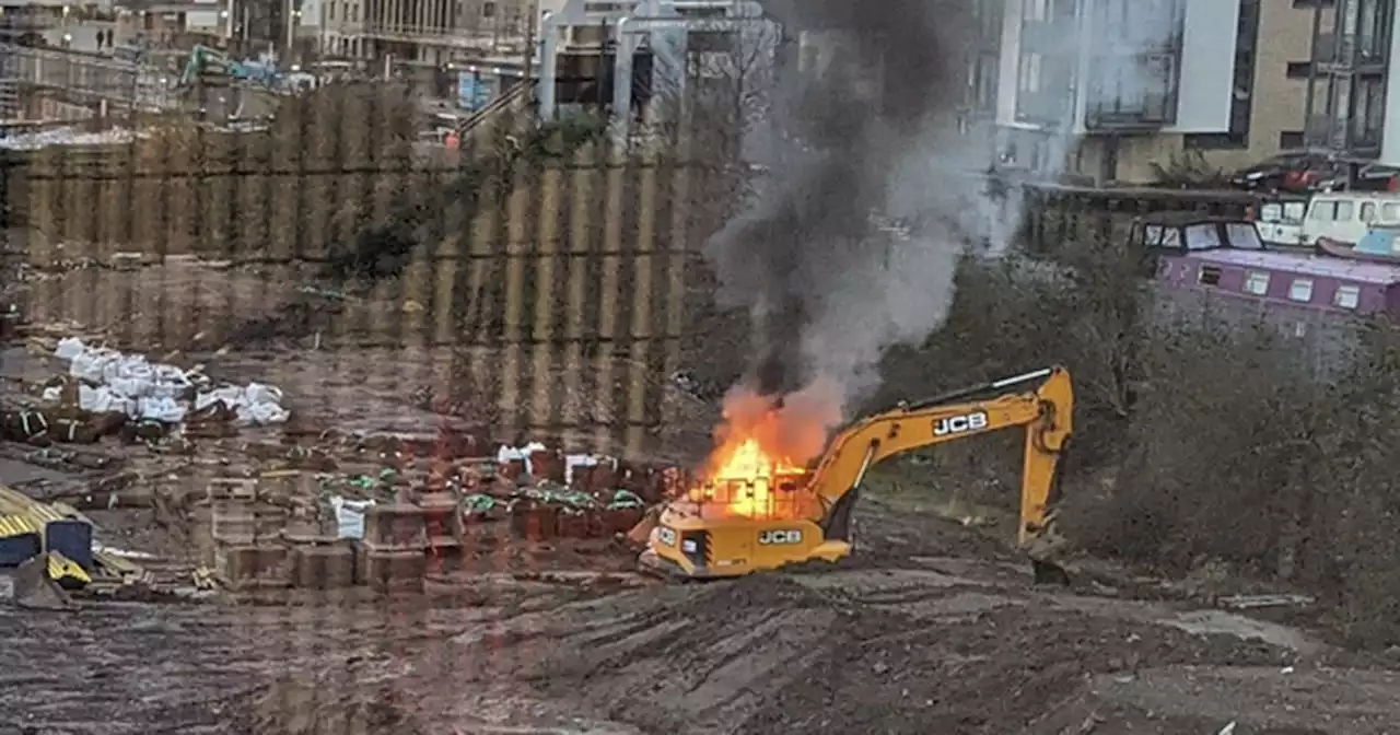 Digger bursts into flames as fire crews tackle blaze at Edinburgh building site