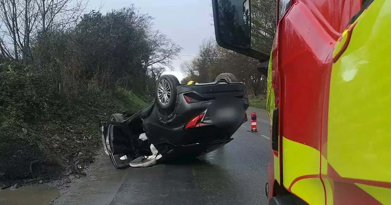 Drivers warned of 'treacherous conditions' after car flips on morning commute