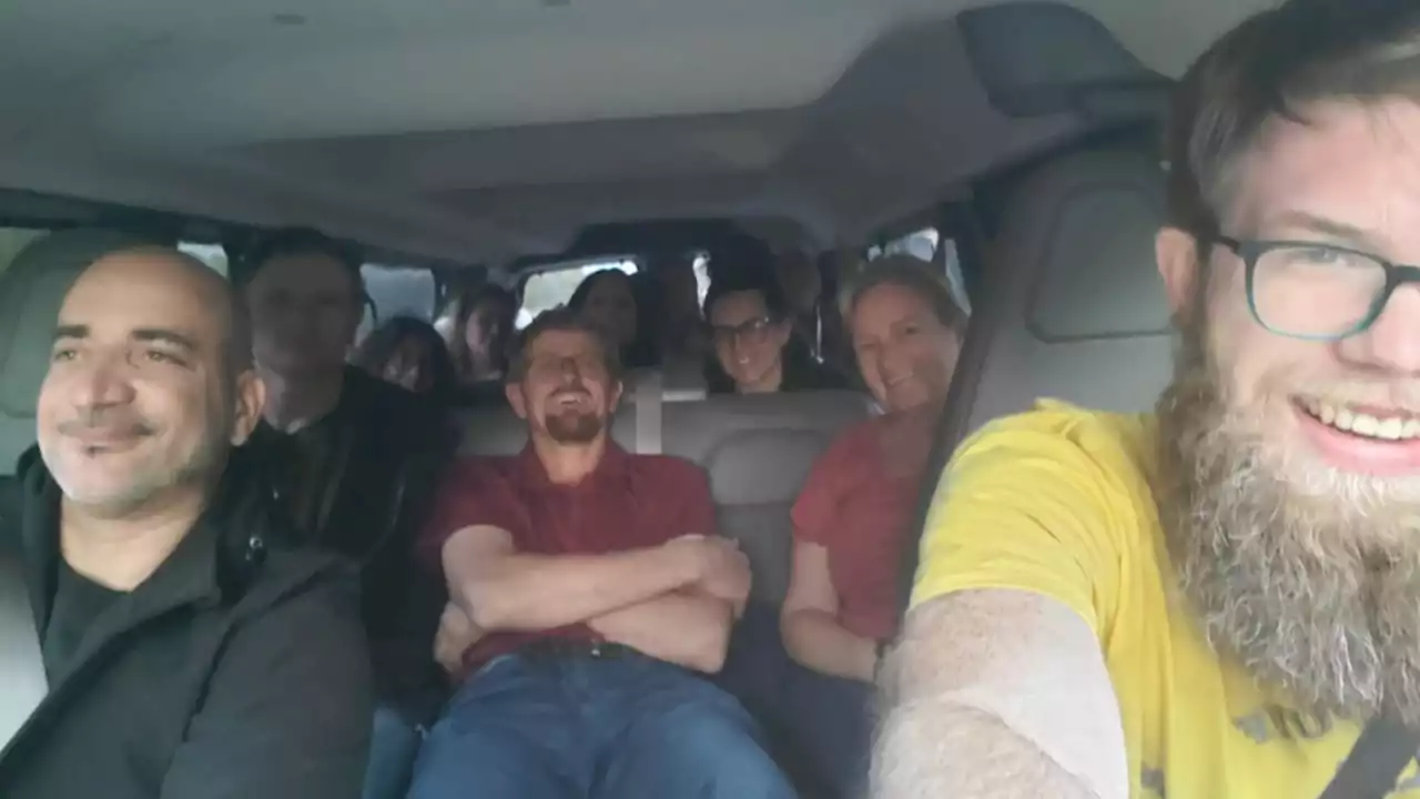 13 stranded strangers went on a road trip after their flight was canceled. Here's what happened