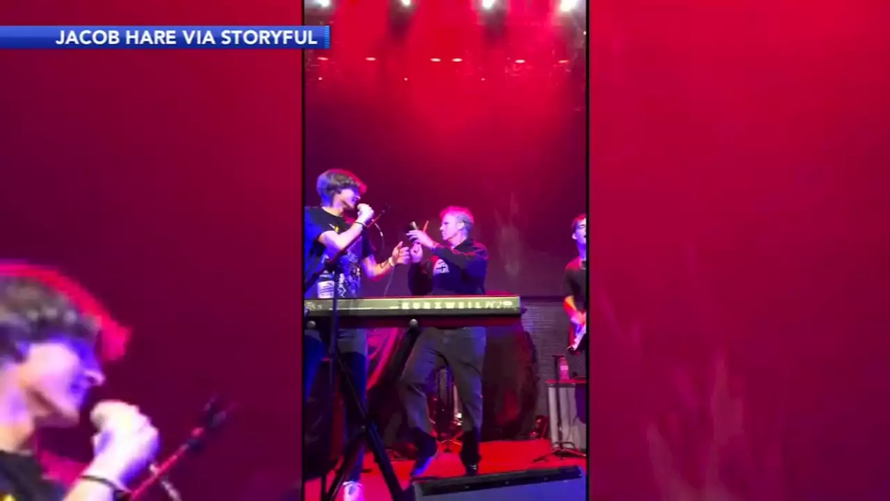 Will Ferrell with cowbell surprises son during his first live performance