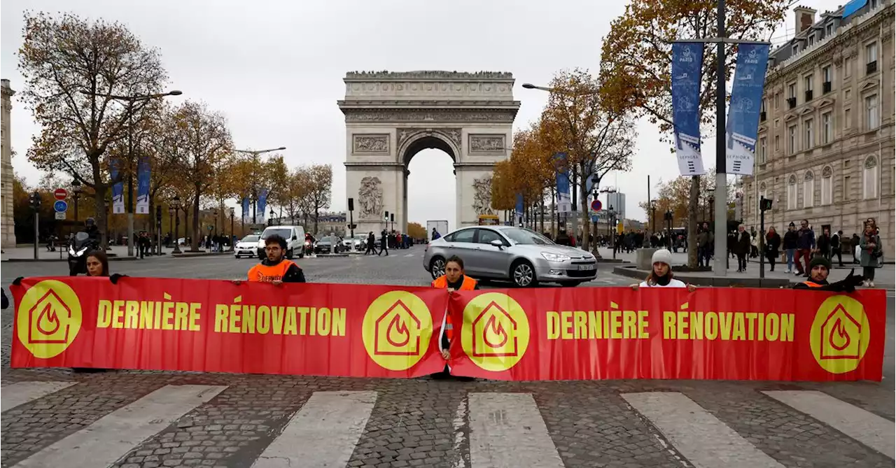 Climate activists block Champs Elysees to demand better insulation of buildings