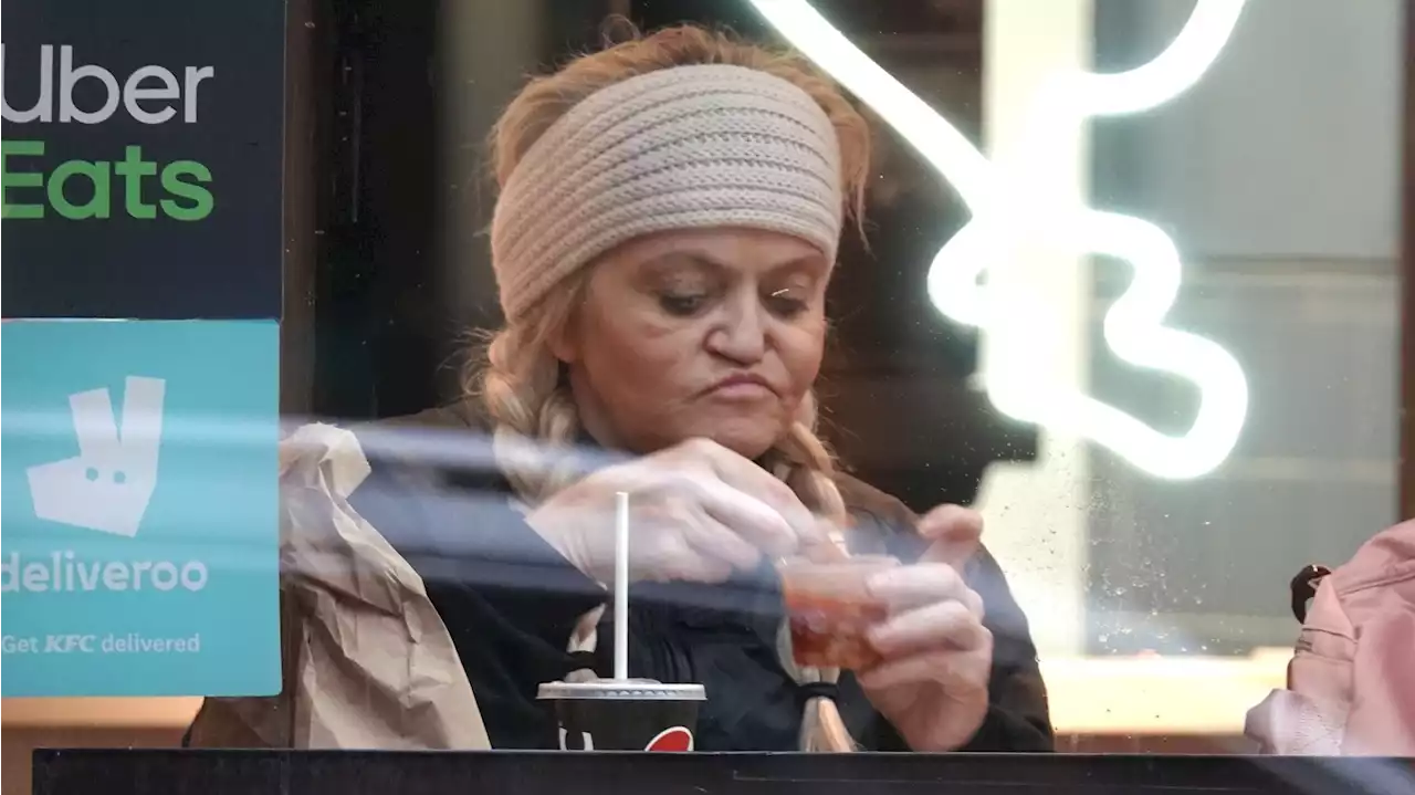 Danniella Westbrook battles the flu as she tucks into KFC in London