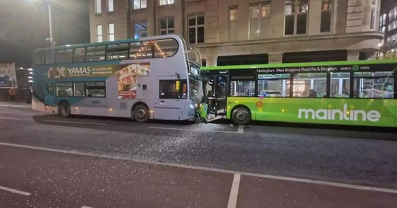 Multiple people injured as buses crash head-on in busy street