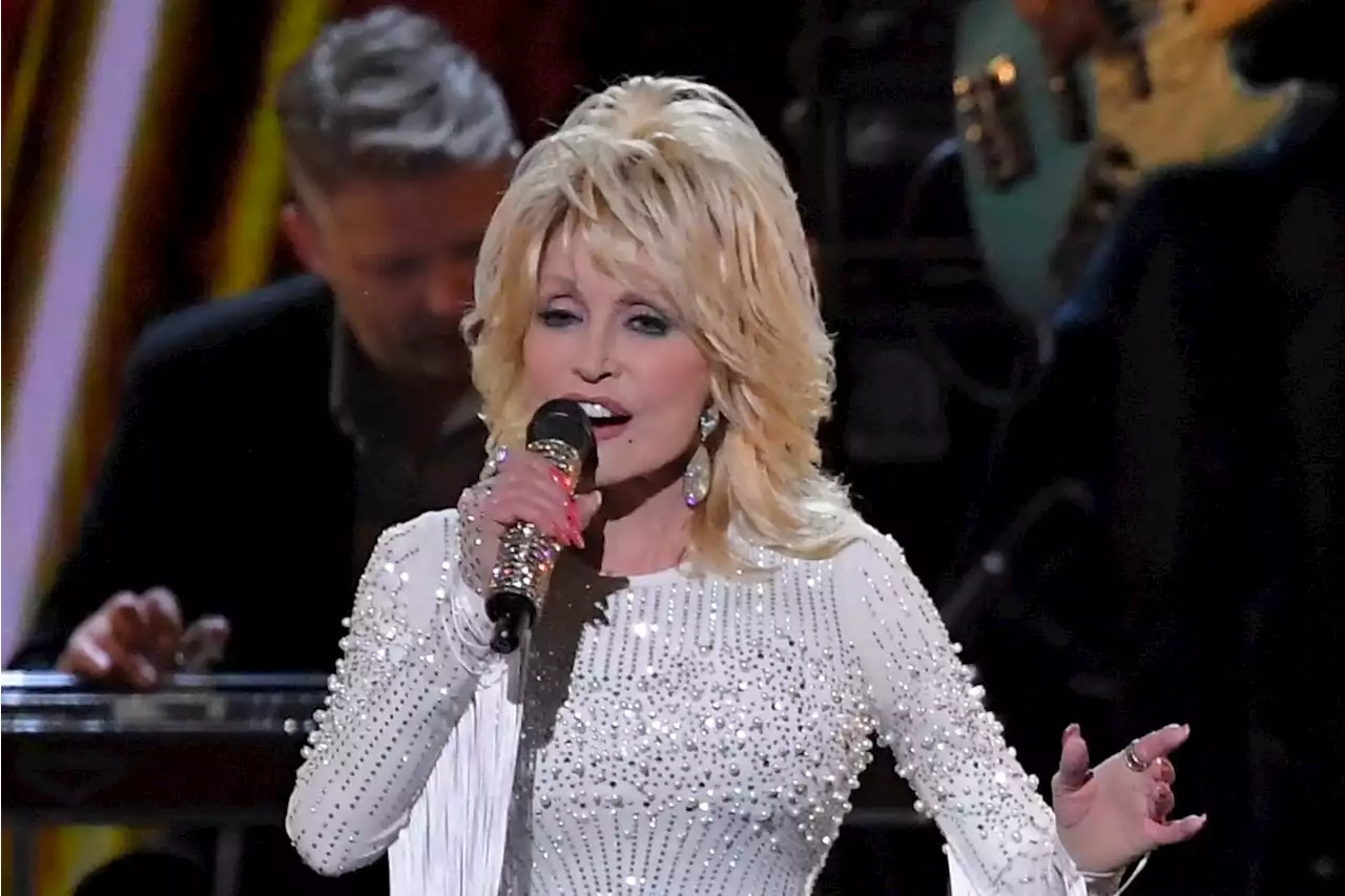 Dolly Parton’s Dollywood says it will pay all tuition costs for employees pursuing higher education