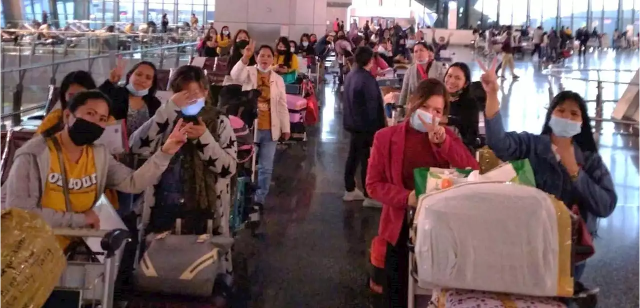 Over 200 distressed Pinoys return home from Qatar --DFA