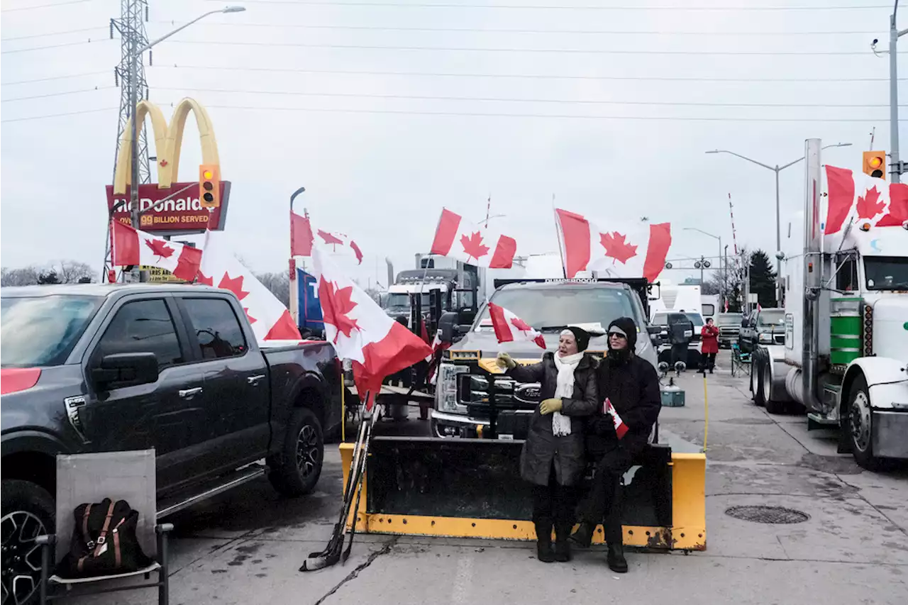 COVID truck blockade shutters Ford plant