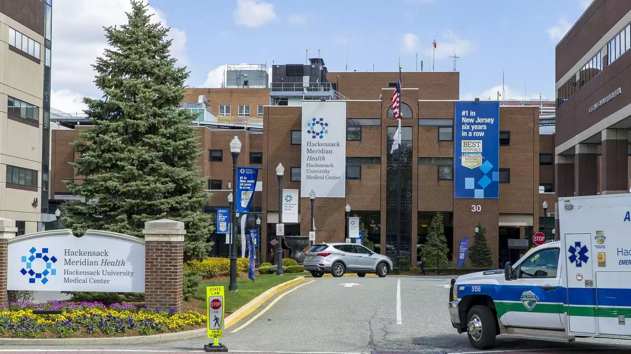 Hospital staffer set on fire by travel nurse in critical but stable condition, authorities say