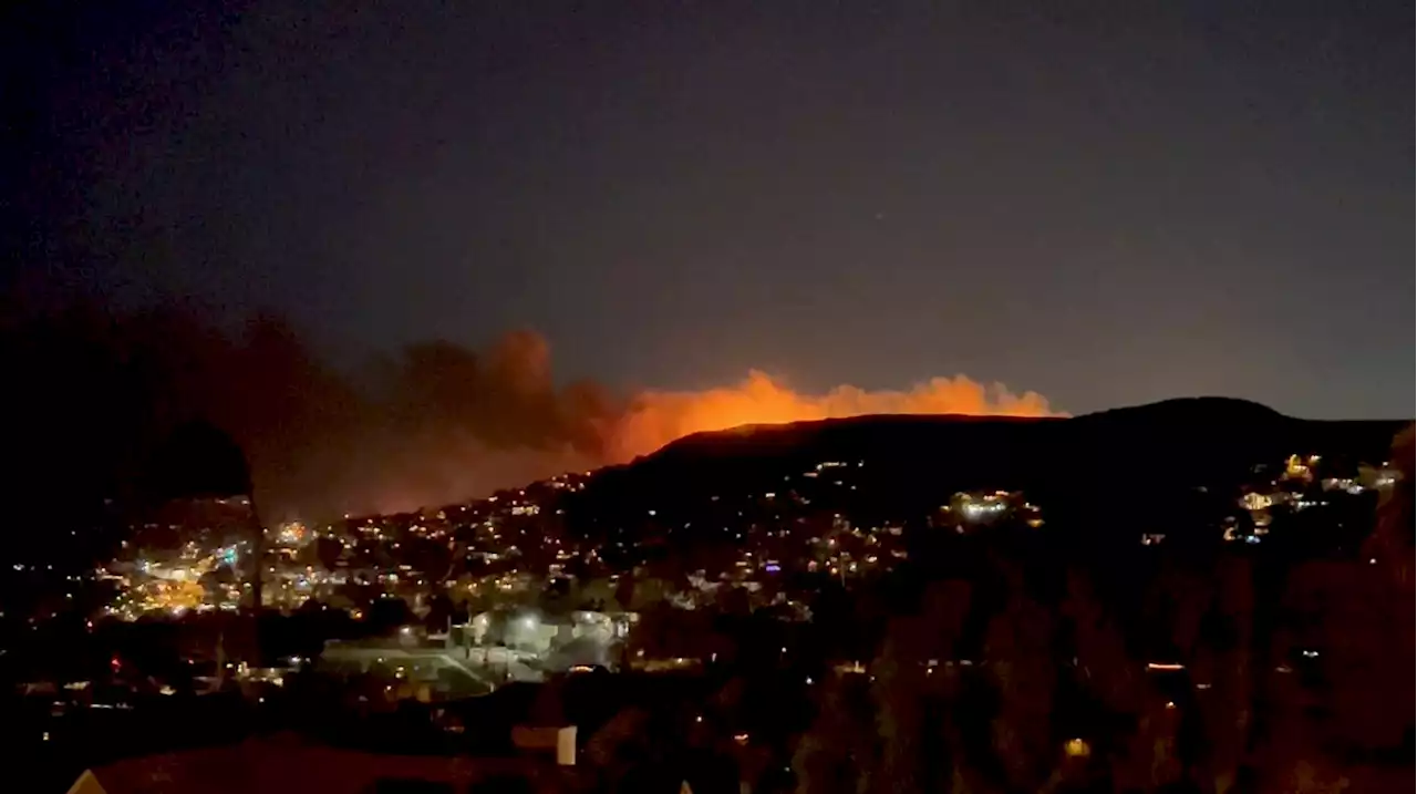 Brush fire rages in Southern California amid record heat, worsening drought