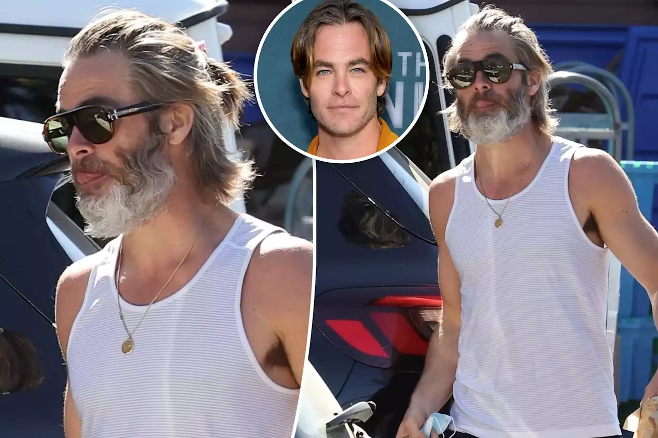 Chris Pine looks unrecognizable with long hair and overgrown beard