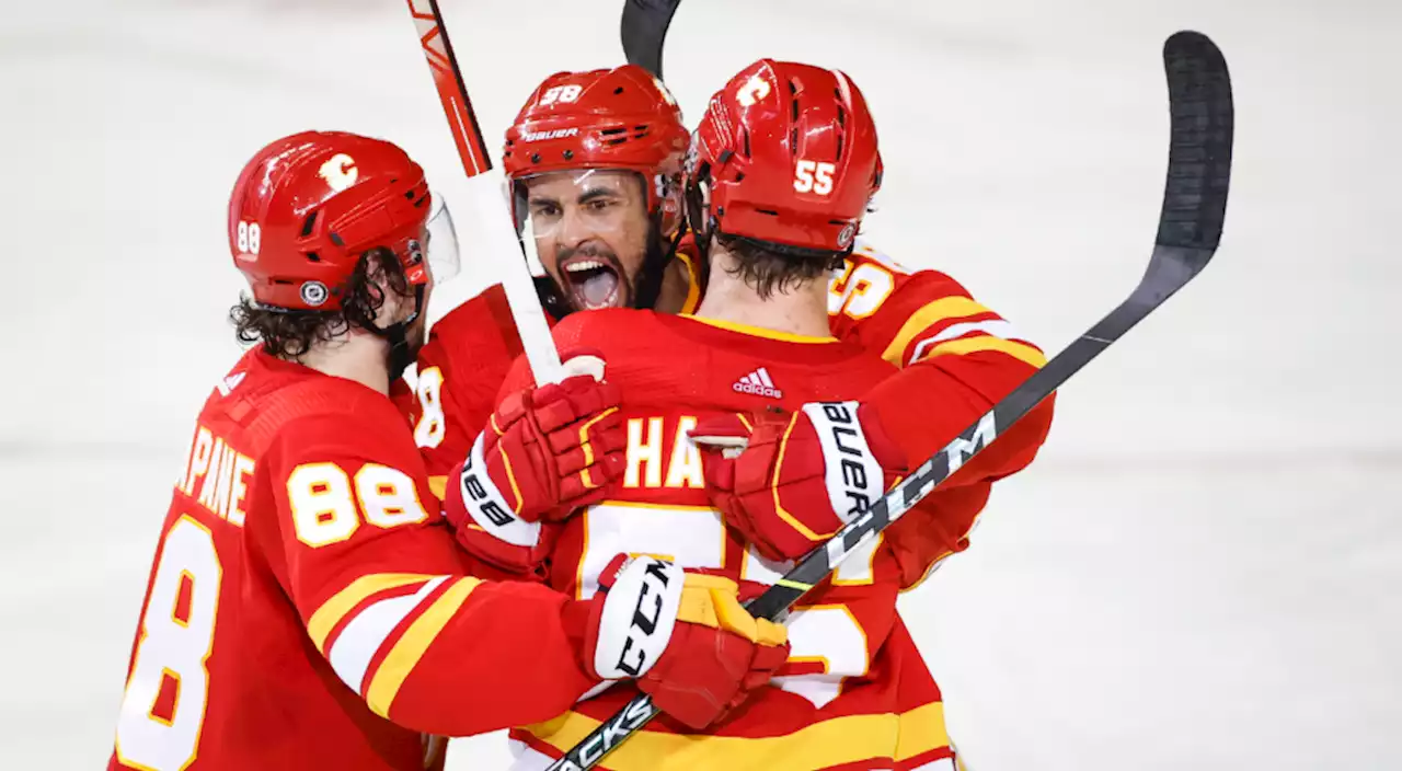 Flames defence uses big hits, big goals to secure win in 'playoff-type game'