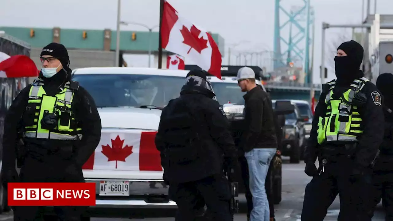 Ambassador Bridge: Police launch bid to clear Canada trucker blockade