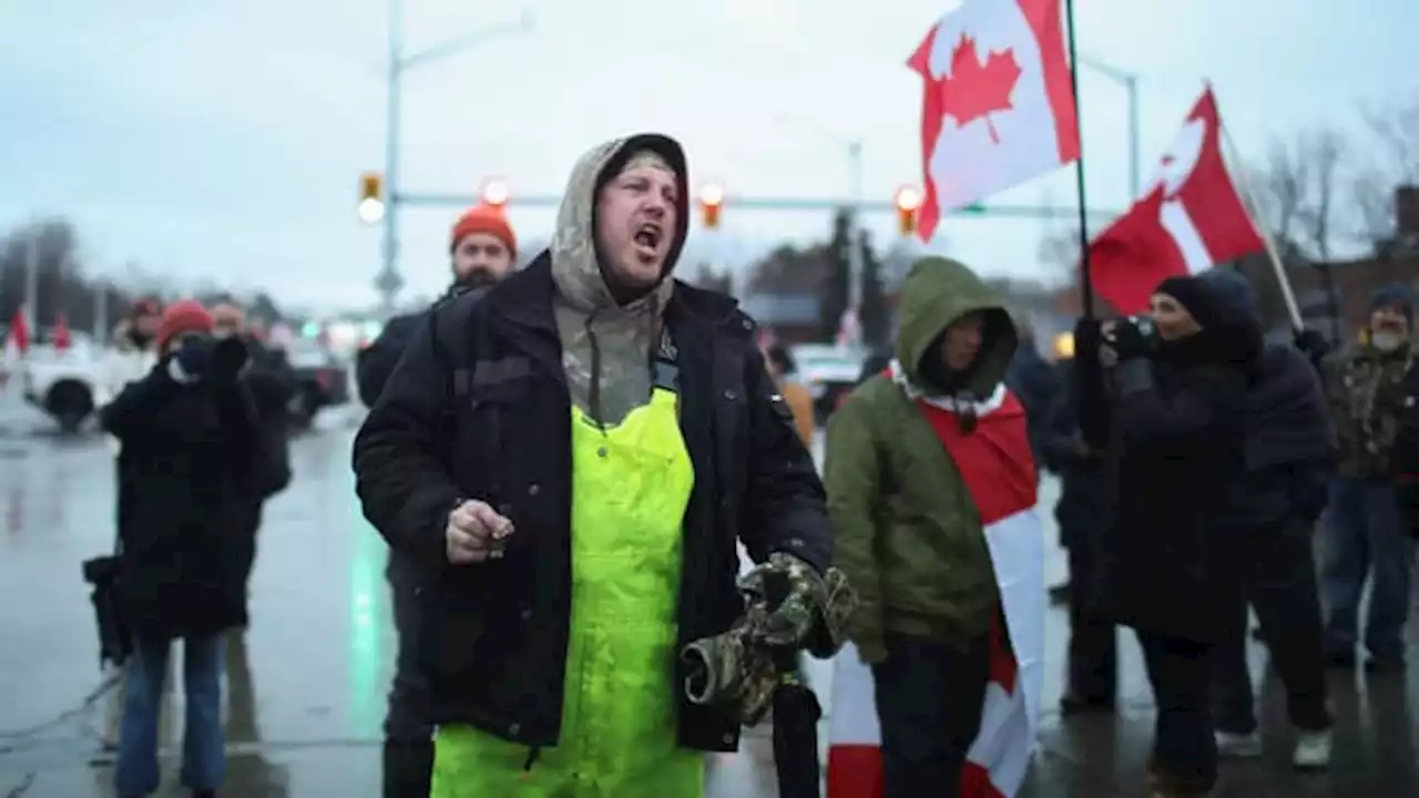 Protesters defy injunction order, continue to occupy key U.S.-Canada bridge