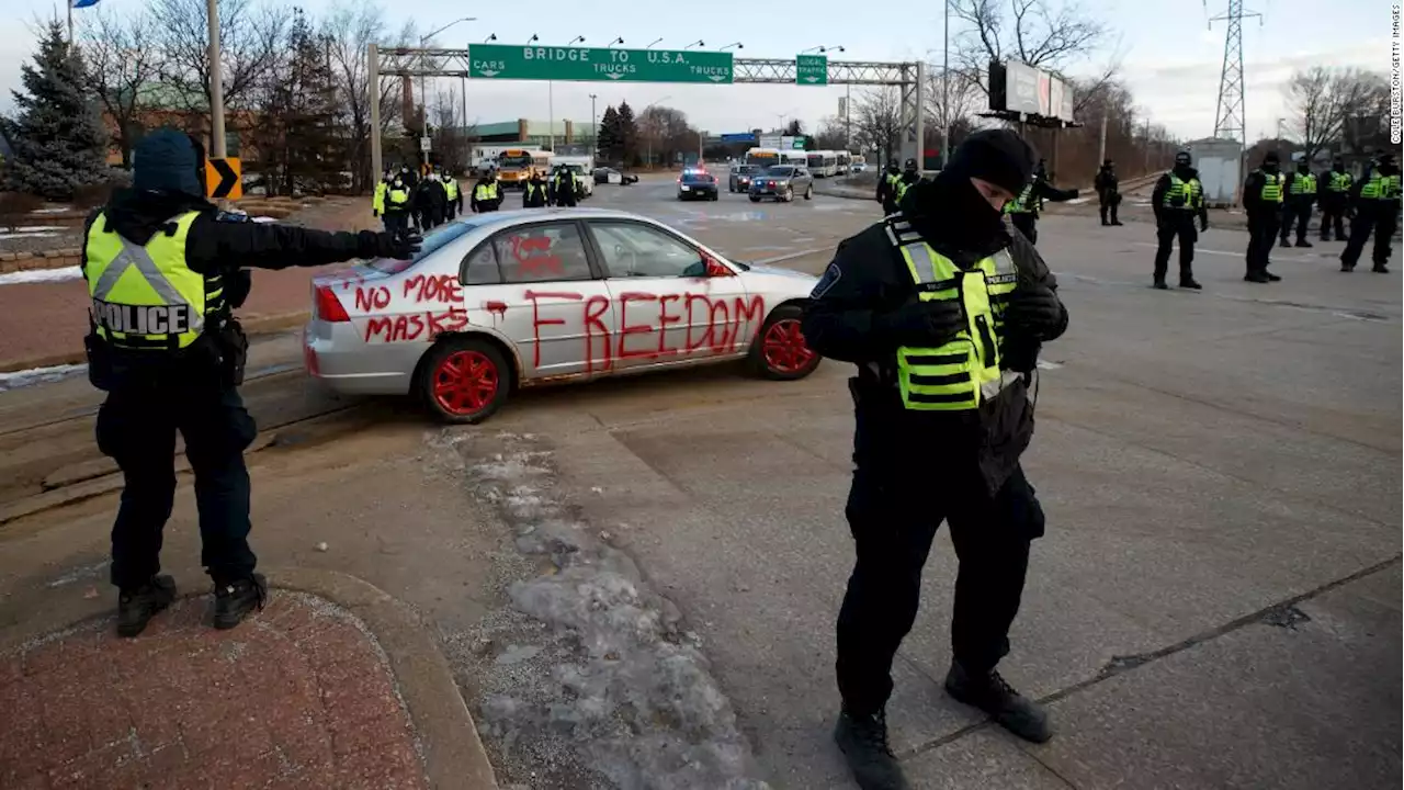 Canadian police begin attempt to clear protesters blocking Ambassador Bridge to US