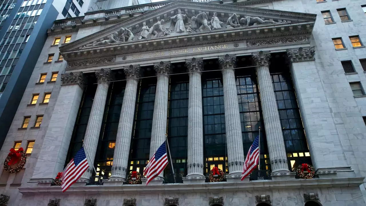 Wall Street begins to drop mask mandates