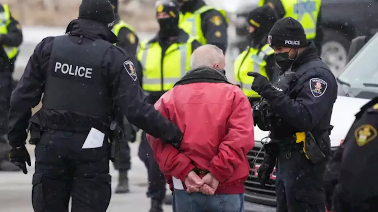 Police break up remaining protest at Windsor's Ambassador Bridge, make 12 arrests | CBC News