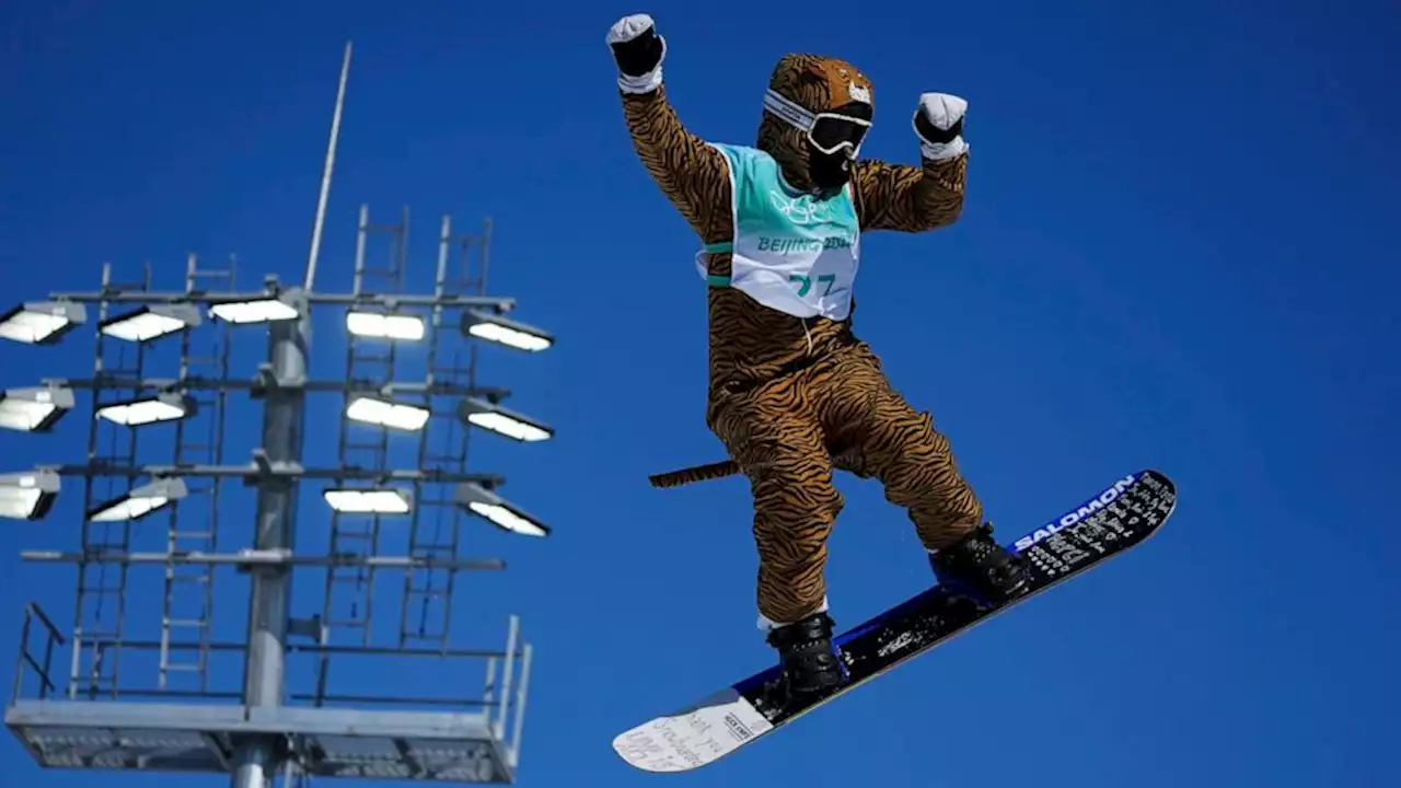 Injured Olympian gets big air in big-cat costume for kicks