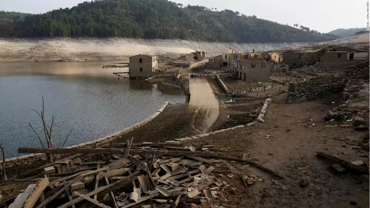 A ghost village emerges from the cracked earth as drought empties Spanish reservoir