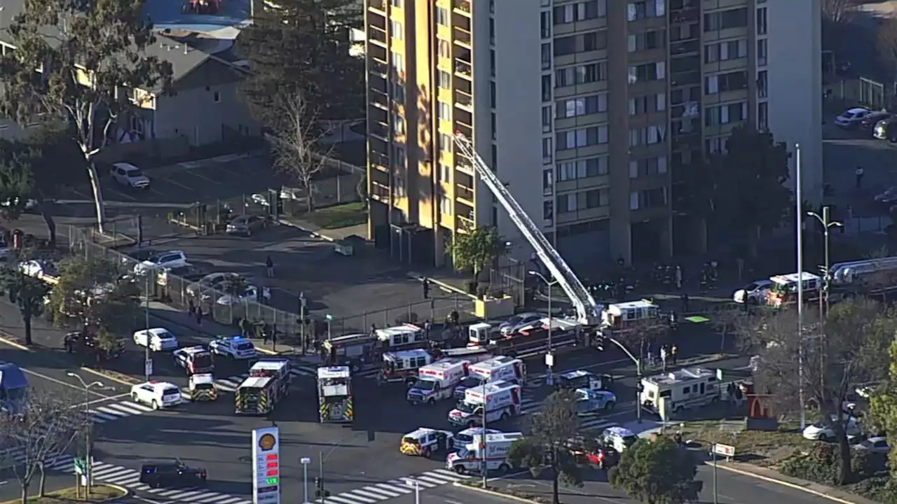 Firefighters battling 2-alarm fire inside residential building in Oakland