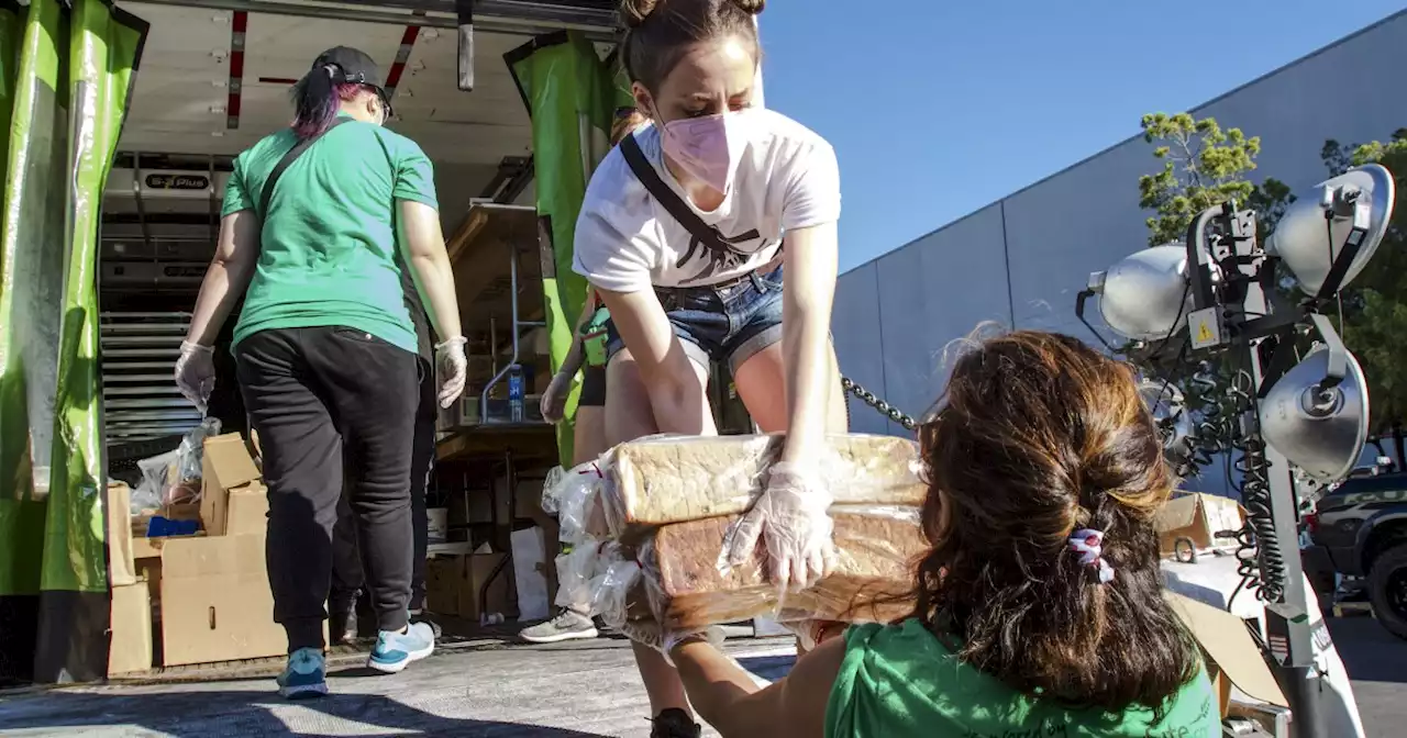 At the ultimate Super Bowl party, nearly 2,000 pounds of food are saved from the dumpster