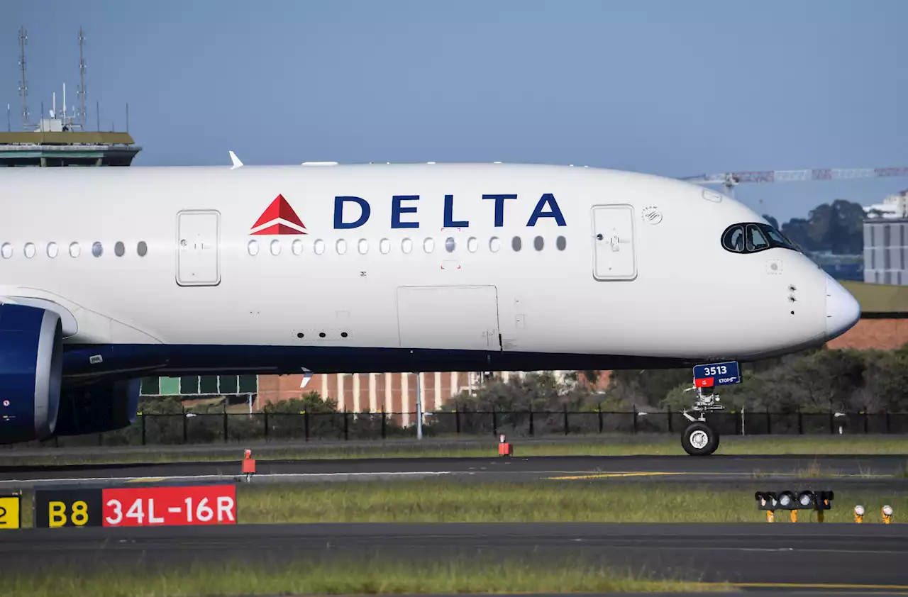 Delta passenger tries to open door mid-flight, FBI investigating—police