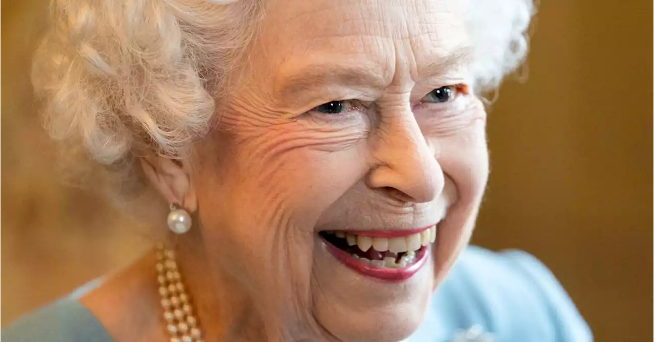 Queen Elizabeth quips she 'can't move' too much