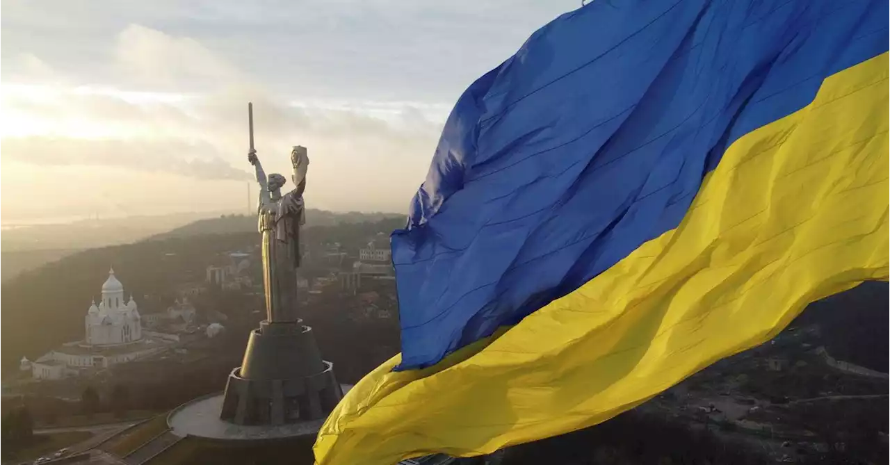 'We fear no one:' Ukrainians raise flags to defy Russia invasion fear