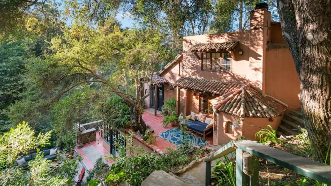 $3.8M Topanga home has a natural rock-carved sitting room