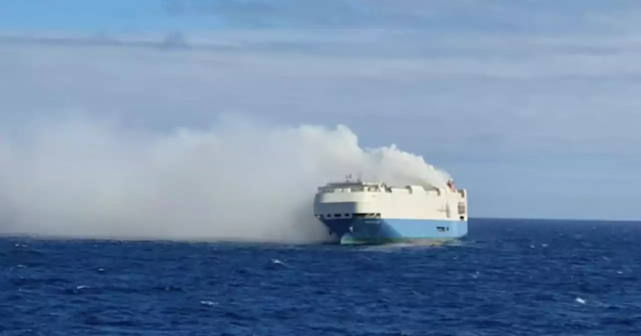 Fire forces crew to abandon cargo ship carrying hundreds of luxury cars