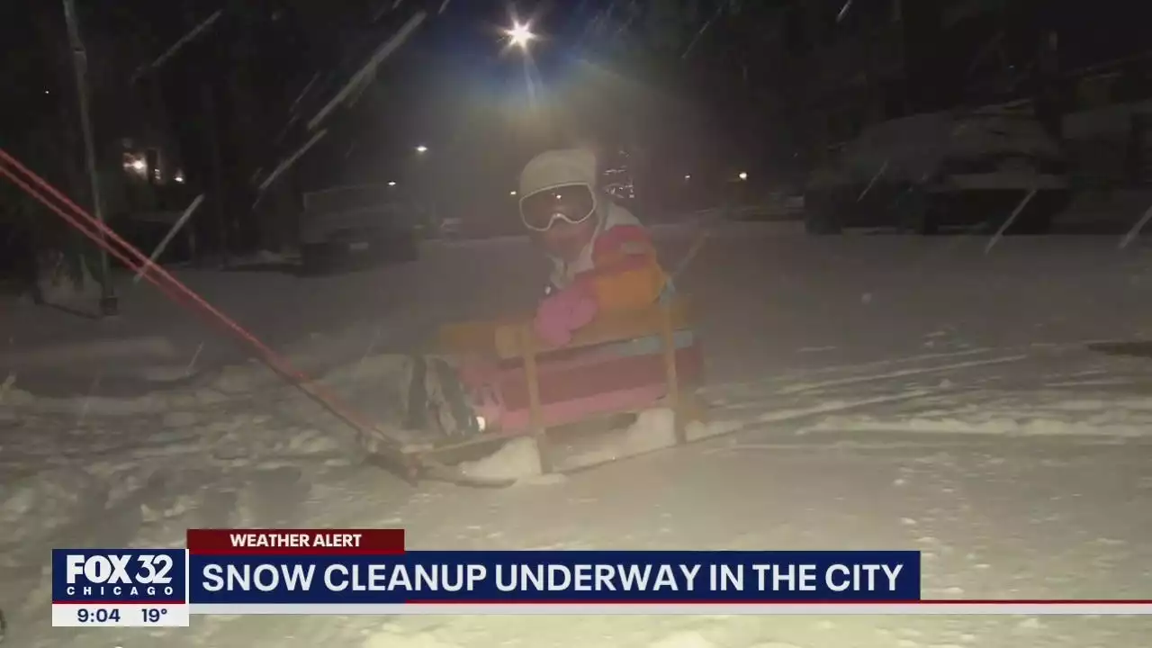 Chicagoans break out the shovels, kids enjoy snow after whiteout conditions snarl evening commute