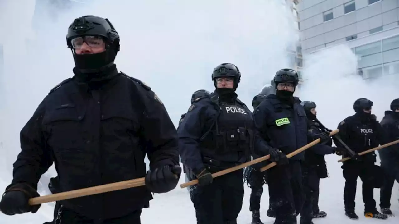 Canadian police use pepper spray, stun grenades in push to clear capital