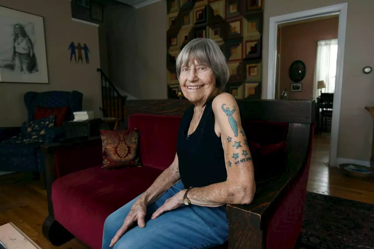 To celebrate turning 100, woman gets another tattoo