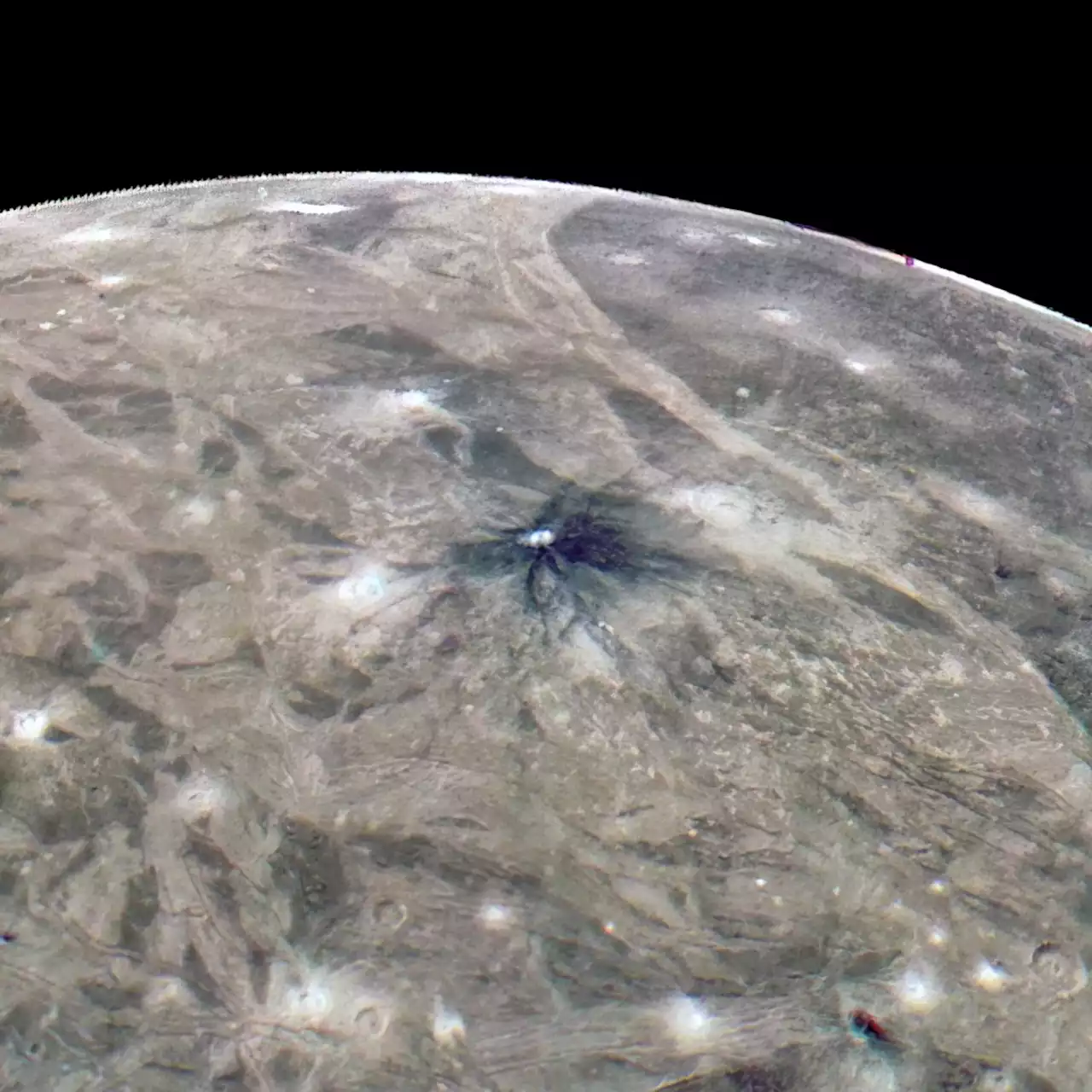 Juno Spots Dark-Rayed Crater on Ganymede | Sci-News.com