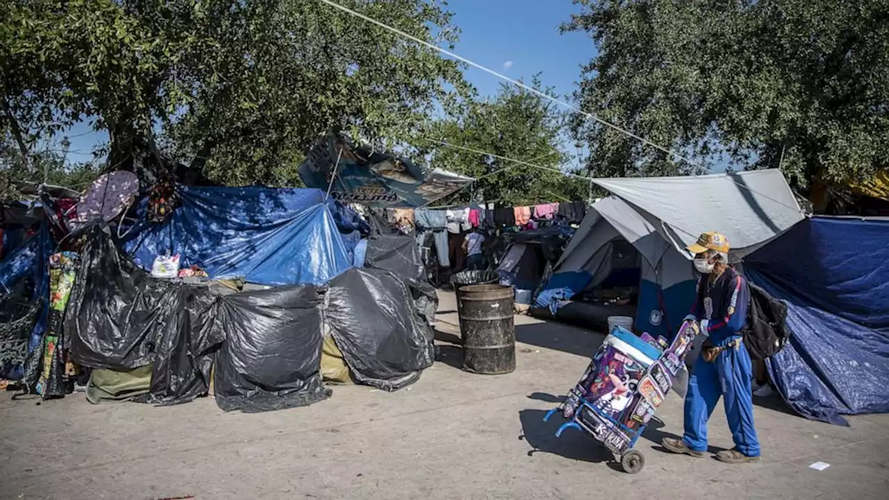 Seeking asylum, migrant encampment grows in Mexico amid uncertainty over US policy