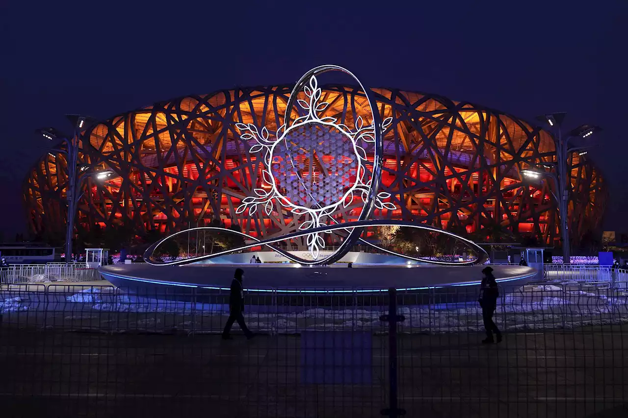 Beijing's Olympics close, ending safe but odd global moment